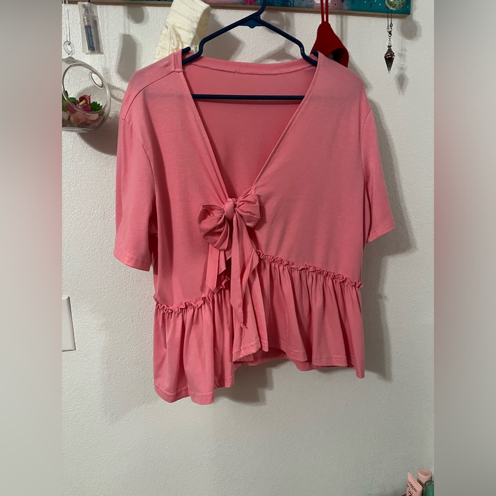 Pink blouse with bow